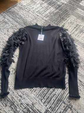 Black Sweater with 3D Petal Sleeve Detail